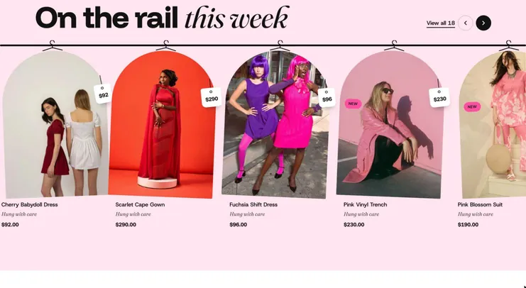 Rail demo store: dresses hanging on a horizontal rail with swinging price tags